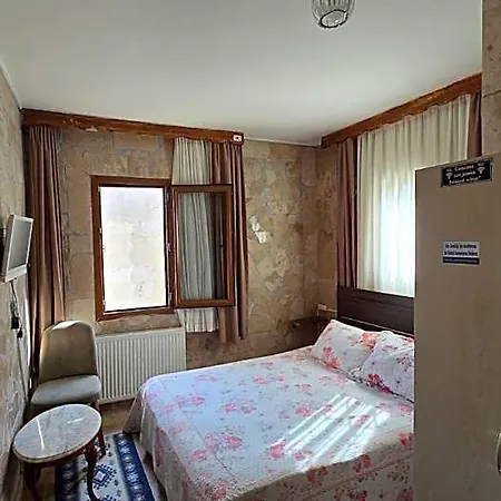 Отель Uchisar Cave House Невшехир